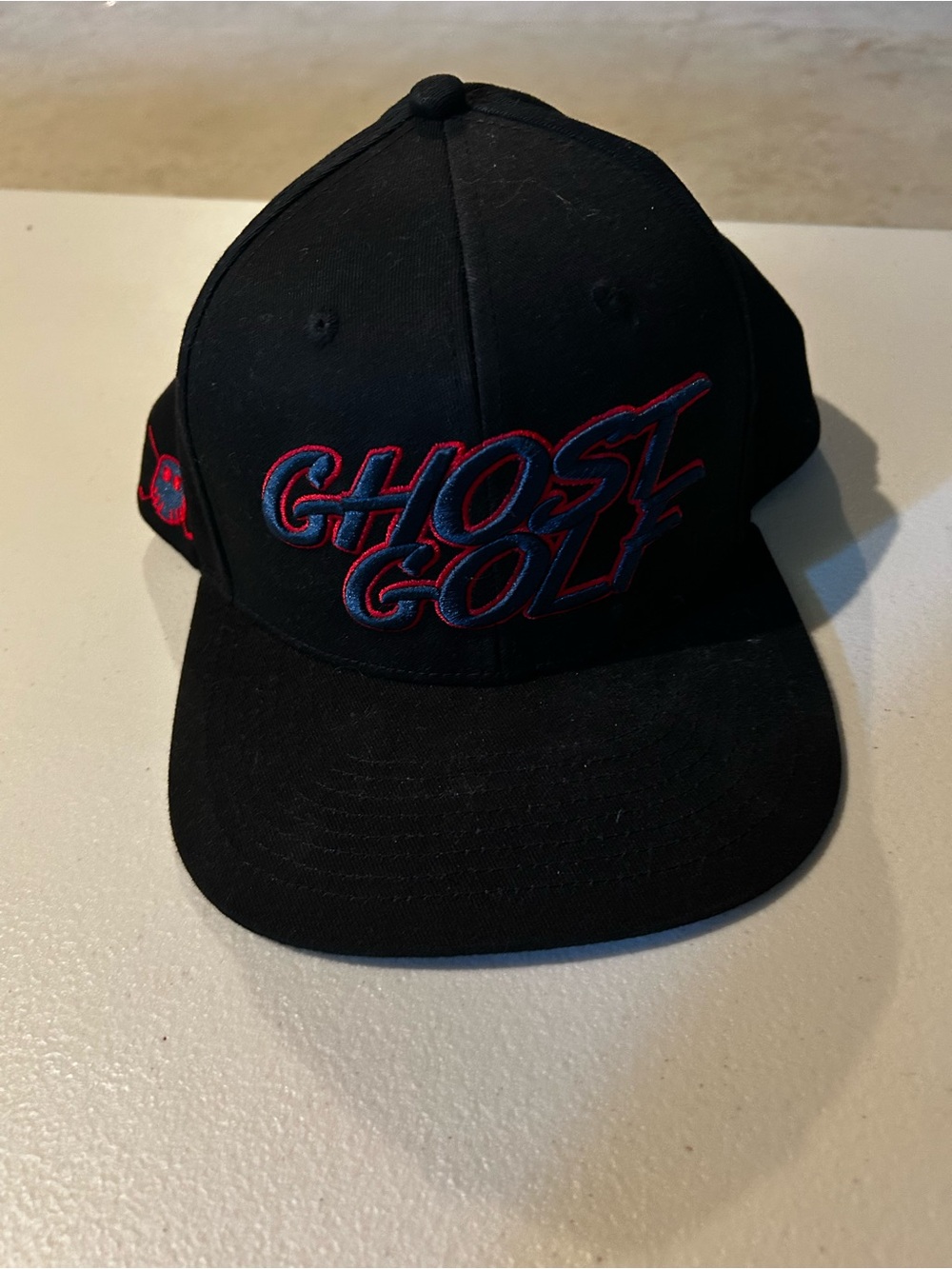 Ghost Golf Black Snapback Hat with Red & Blue Embroidery